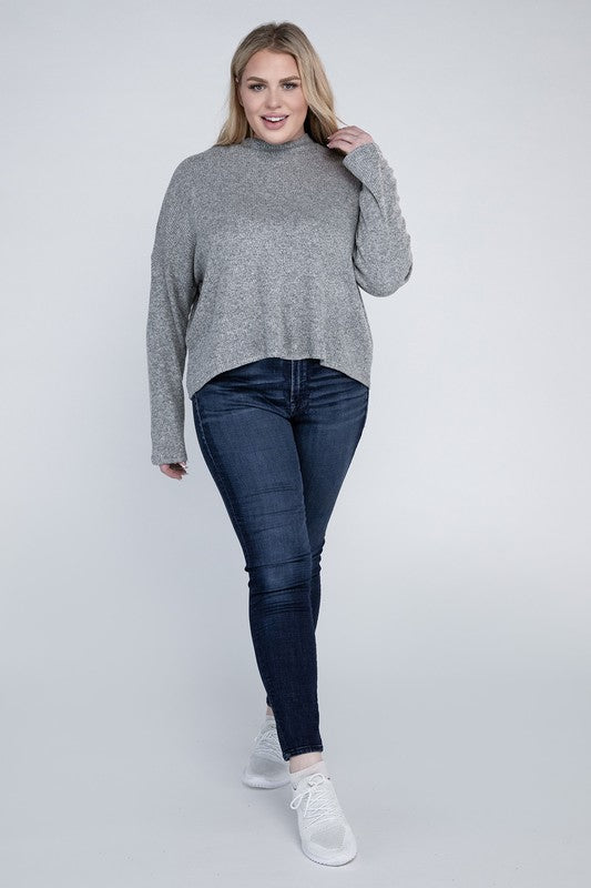 Plus size full body view of Raya Curvy Plus Drop Shoulder Top in heather gray styled with jeans and sneakers.