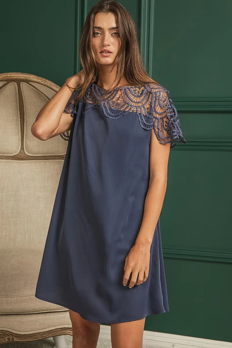 Model front view in Misty Navy Crochet Lace Boho Dress with boat neckline.