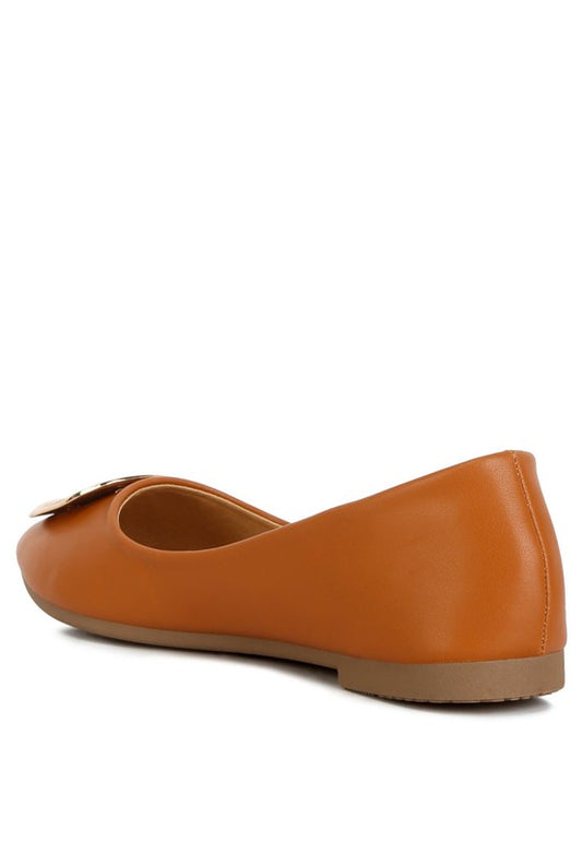 Back angle view of tan ballet flats showing faux leather design