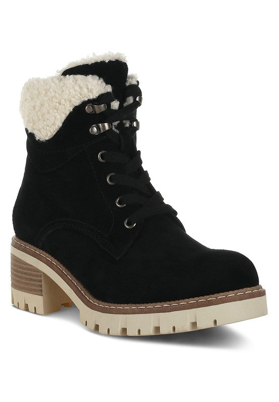 Front angle of Black Madoka Chunky Ankle Boots with lace-up front and faux fur collar detail.