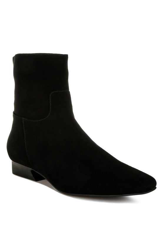 Front angle view of the black Hakra suede boot showing flared low heel, closed almond toe, and suede finish.