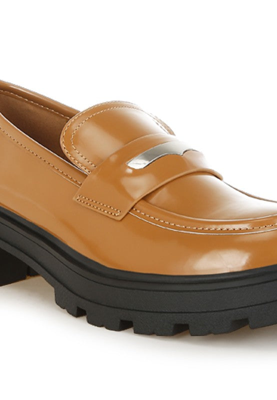 Close-up of Tan Gleam Stride Chunky Loafers showing faux leather finish and cushioned insole.