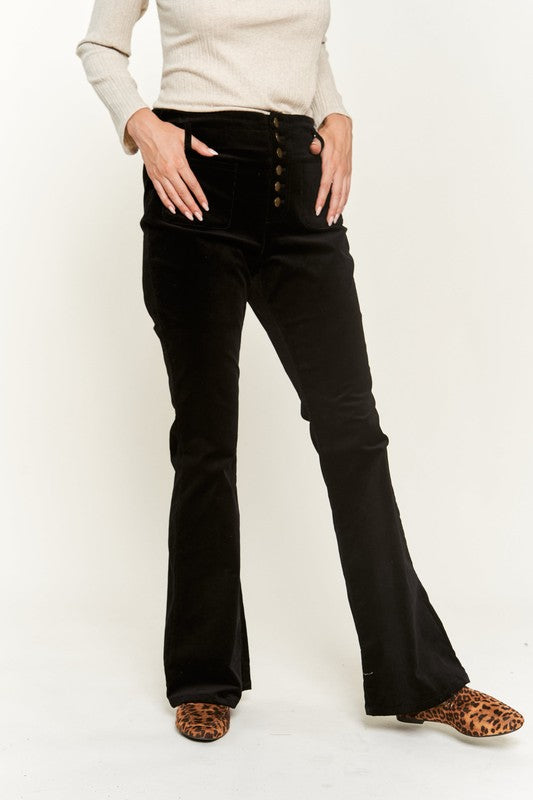 Front view of Taran Plus Size Corduroy Flare Pants in black showing six-button fly closure