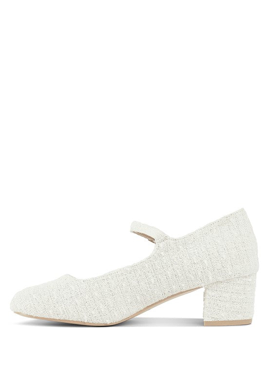 Medial angle of White Antara Tweed Mary Jane Heels with cushioned insole and block heel.