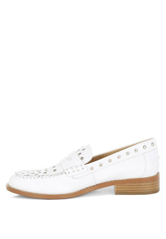 Side view of White Oglavia Studded Leather Loafers highlighting studded embellishments, mock stitch detail, and low block heel
