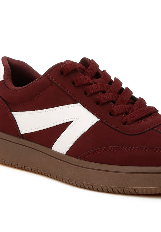 Zoomer Patchwork Sneakers in Burgundy close-up of laces and patchwork