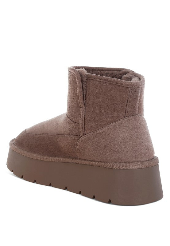 Back angle of Dark Grey Holias Chunky Heeled Snow Boots showing cushioned insole, paneling, and sleek design.