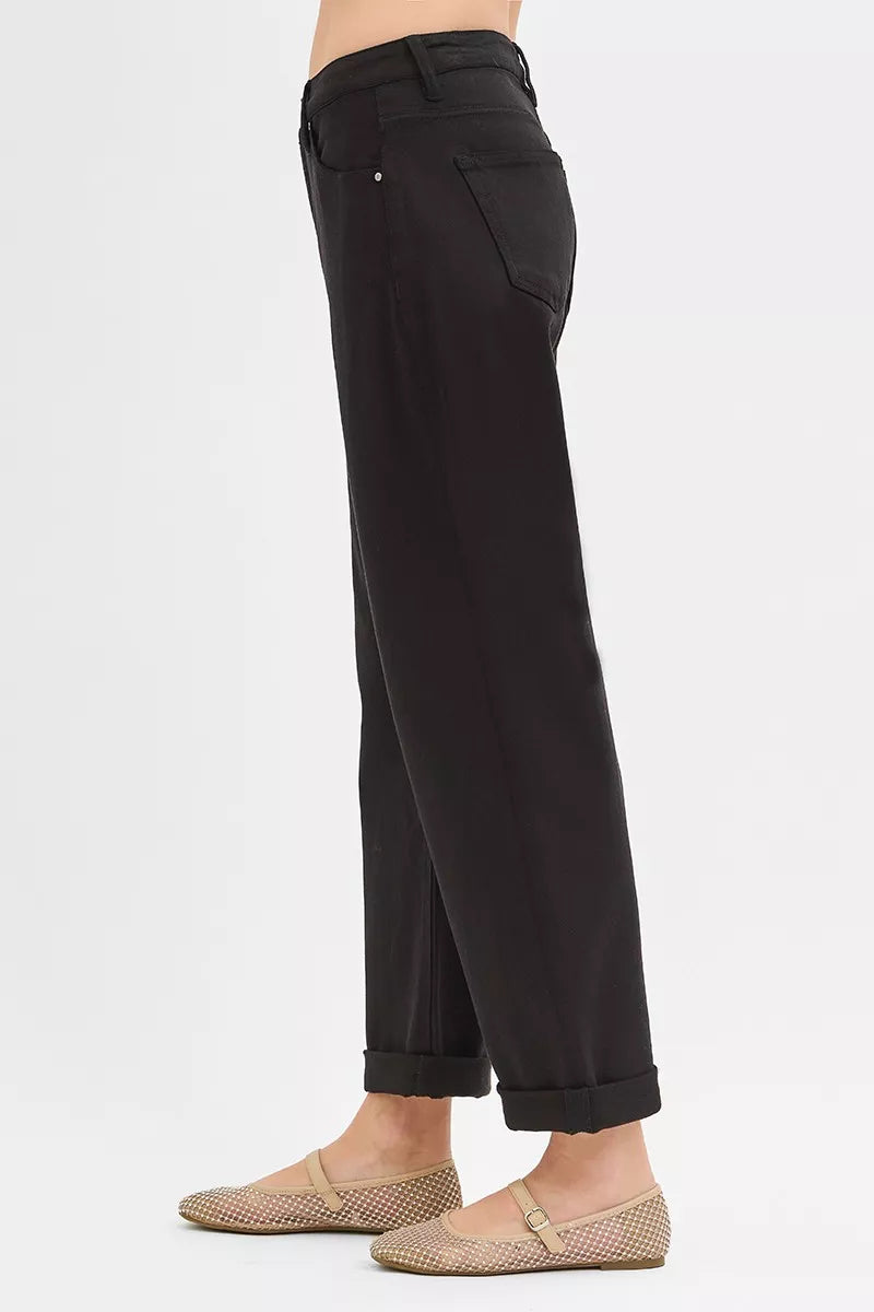 Side view of Trina Black Ankle Barrel Jeans – cropped wide-leg denim.