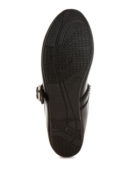 Bottom view of black Kavana Mary Jane Flats highlighting the textured sole and flat heel design.