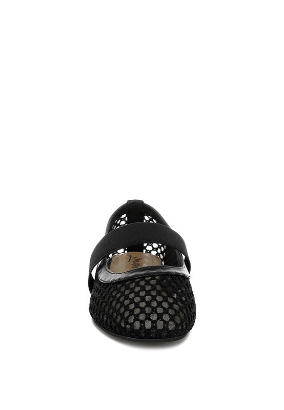 Front-facing view of Black Nayela Flats highlighting square toe and modern style.