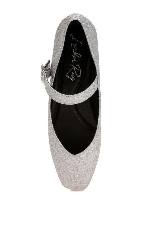 Top view of silver glitter ballerinas showing strap placement and toe shape.