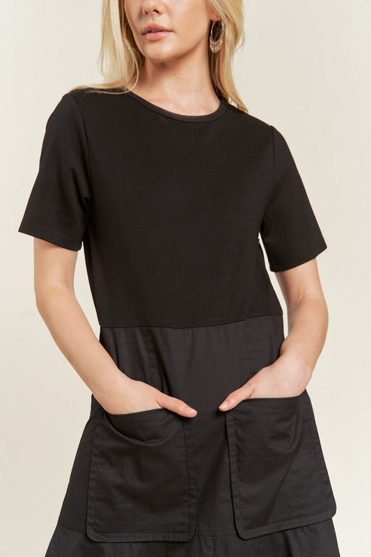 Close up of Felicity Knit Mix Dress in black highlighting patch pockets and fabric mix