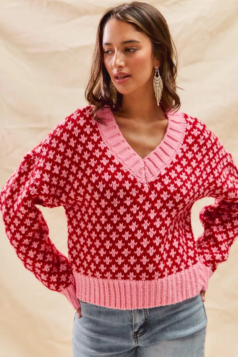 Christmas Sweater - Chloe color block sweater front view red pink diamond knit.