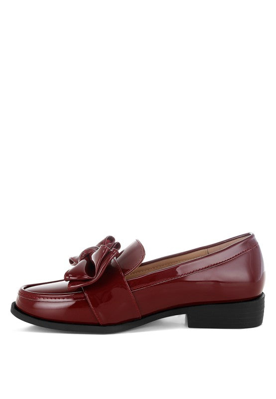 Side view of Araminta Classic Chunky Bow Loafers in Burgundy with low block heel and soft finish