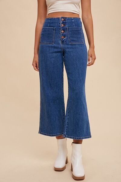 Front view of Frankie dark wash jeans with high waist and vintage button fly closure.