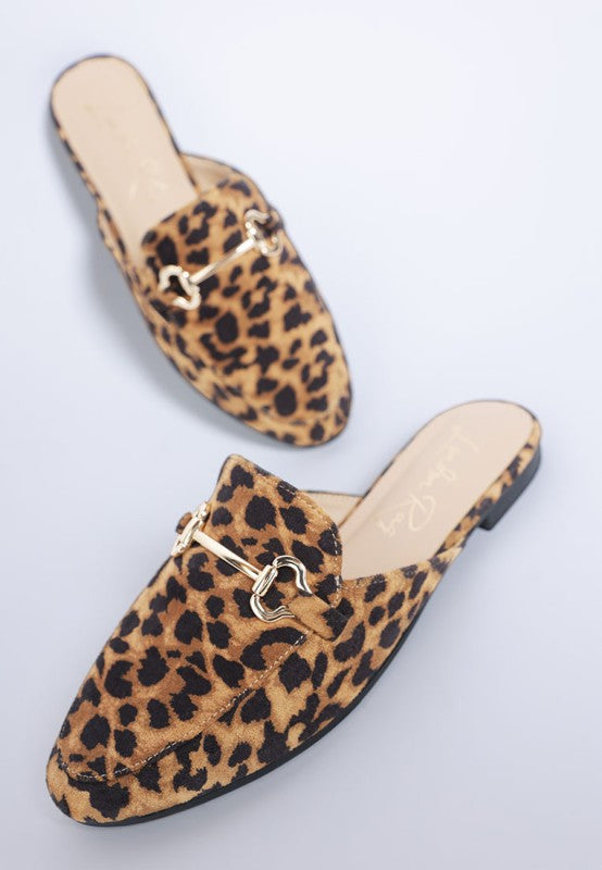 Top view of Alpine Horsebit Mules showing slip-on design, cushioned insole, and stylish leopard print microfiber finish.