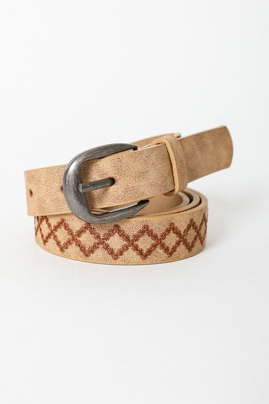 Sicilly Skinny Diamond Stitched Belt in camel vegan leather rolled up showing diamond stitching and buckle.