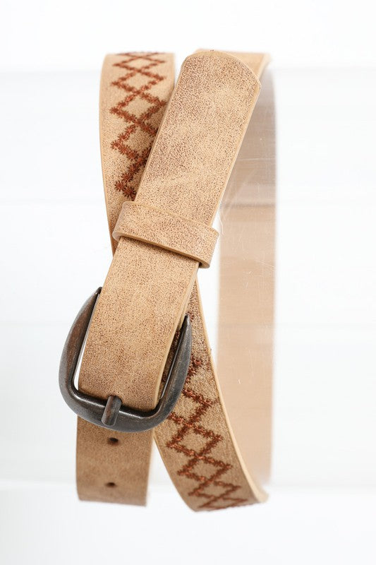 Rolled-up Sicilly Skinny Diamond Stitched Belt in camel vegan leather with diamond stitching and buckle detail.