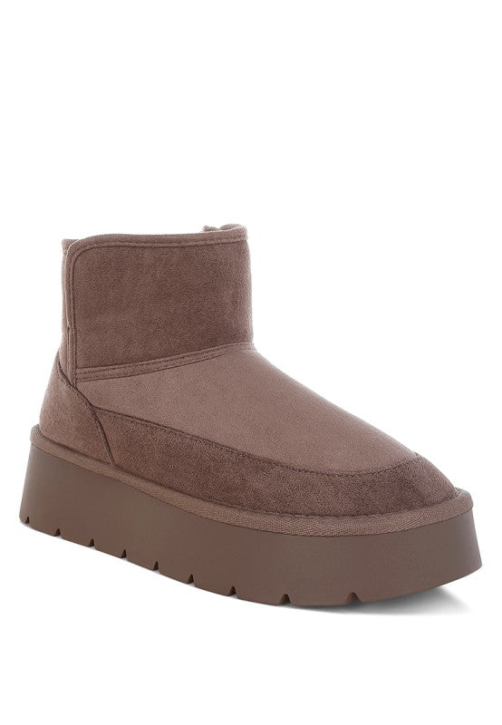 Front angle of Dark Grey Holias Chunky Heeled Snow Boots with chunky heel, faux suede finish, and paneling detail.