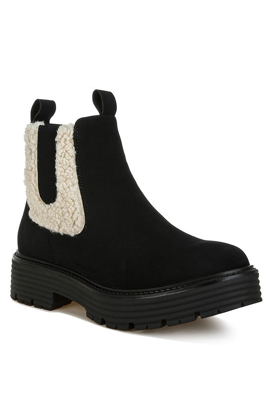 Front angle of Black Mothman Chunky Ankle Boots with faux fur trim and sturdy block heel.