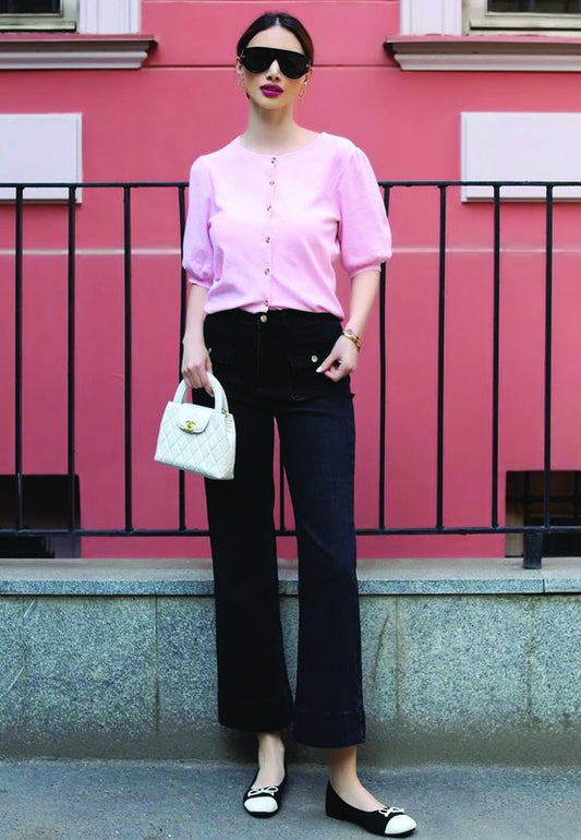 Model lifestyle photo wearing Rosario Two Tone Ballerinas in black and white