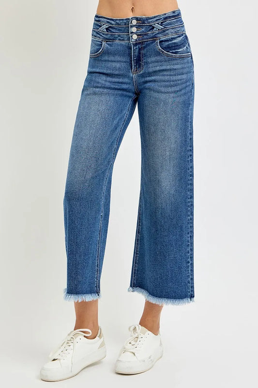 RISEN high rise crop jeans in dark wash with wide band and button closure.