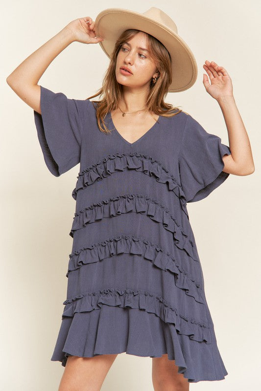 Front view of plus size Gentry Curvy Tiered Ruffle Mini Dress in Cement with V-neck and flared short sleeves.