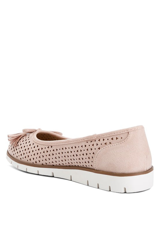 Back inside angle view of blush Pacer vegan leather ballerina flats showcasing the perforated detailing and flat heel.