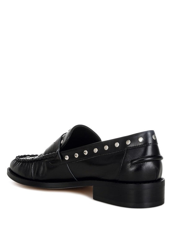 Back angle of Black Oglavia Studded Leather Loafers highlighting block heel and mock stitch detail.