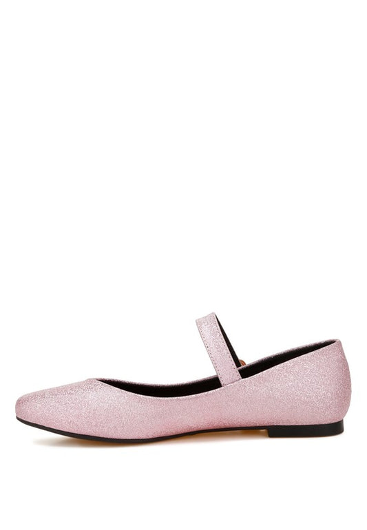 Side view of pink glitter flats with cushioned insole and vintage-inspired strap.