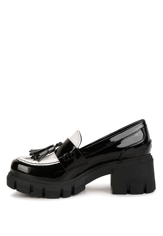 Side angle view of Jonah Platform Loafers in black and white with chunky lug sole