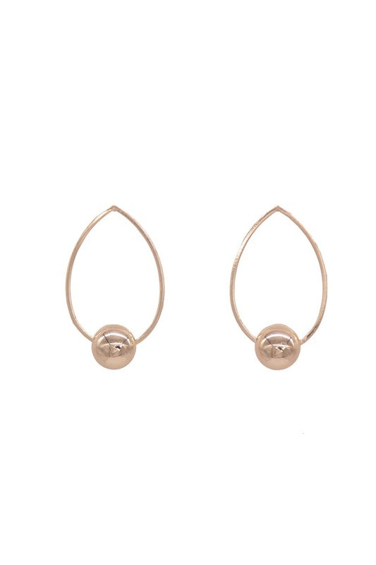 Pair of Oval Drop Simple Hoop Earrings in gold displayed on a flat surface, showing the irregular oval shape and polished finish.