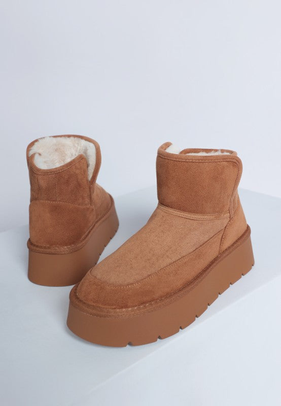Camel Holias Chunky Heeled Snow Boots with faux suede finish, chunky heel, and paneling detail.