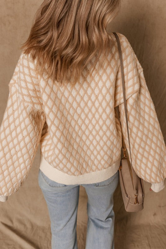 Back of Ximena Rhombus Textured Knit Sweater showing ribbed hem and drop shoulders.