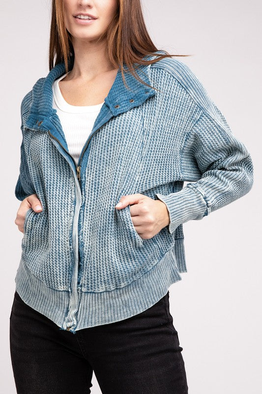 Close-up of Teal Hanna Jacket fabric, highlighting acid-wash details.