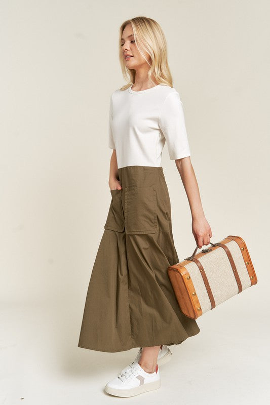 Side view of Felicity Plus Size Knit Mix Dress in olive showing relaxed cotton skirt