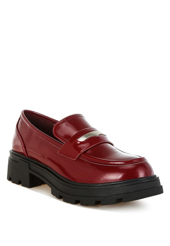 Front angle of Burgundy Gleam Stride Chunky Loafers with metallic penny strap and lug sole.