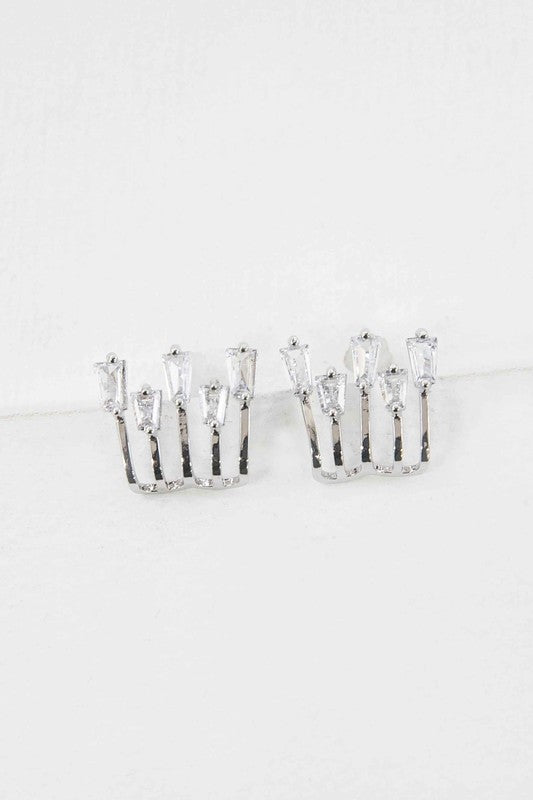 Close-up image of silver baguette stud earrings showcasing minimalist sparkle and modern design.