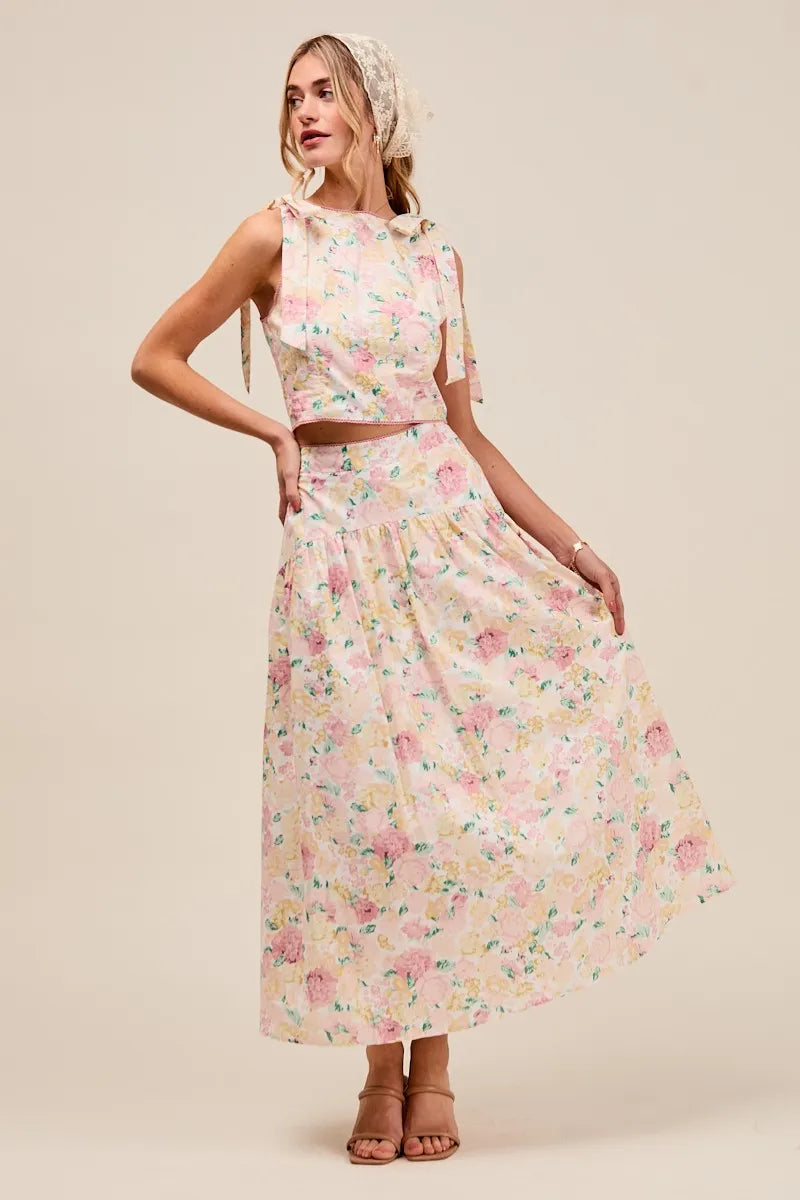 Front view of Soraya Floral Two-Piece Set with tie-shoulder crop top and flowy pink floral tiered skirt.