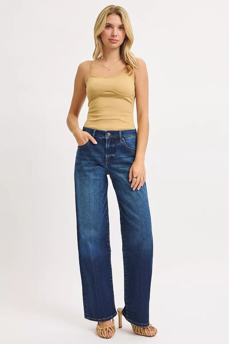 Badu Mid Rise Wide Baggy Jeans Dark Wash angled pose with trendy fit.
