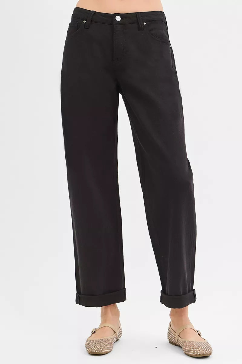 Trina Black Tummy Control Jeans – cropped barrel leg, front angle.