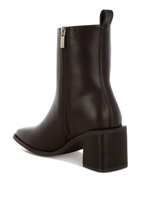 Back angle of Brown Muskox Square Toe Boots showing cushioned heel and vegan leather finish.
