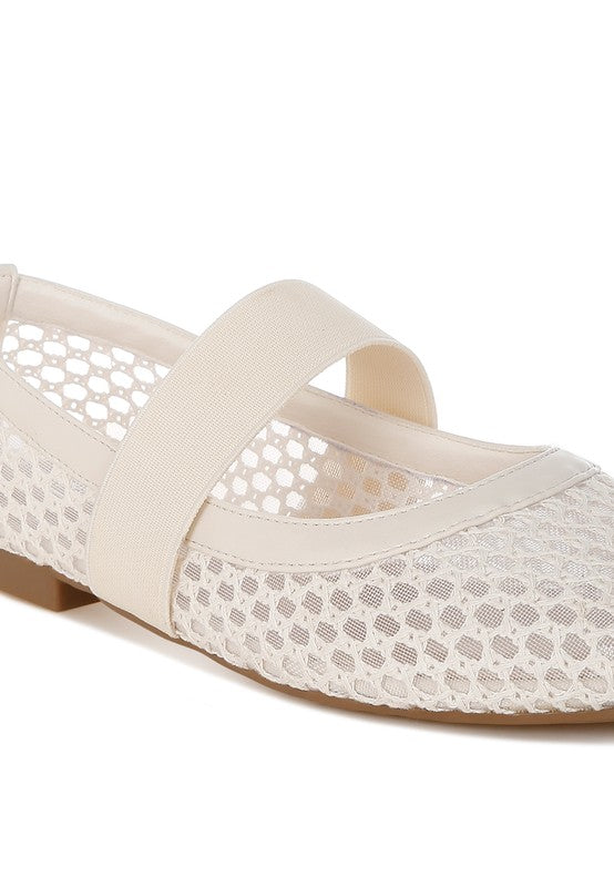 Close-up of Beige Nayela Flats showing mesh and faux leather detail with strap.