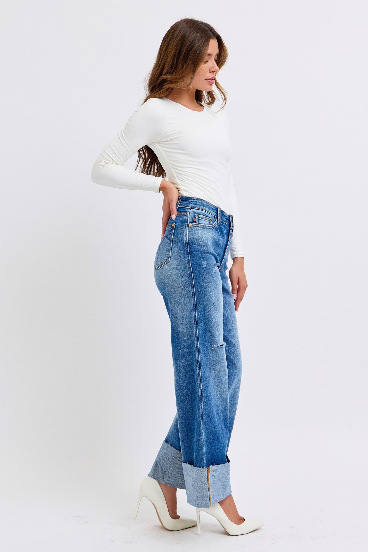 Another full body side angle of Nare Plus Size Judy Blue Jeans with relaxed wide-leg fit.