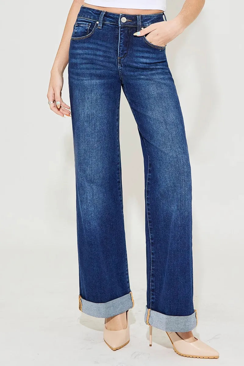 High rise Christina Wide Leg Jeans with tummy control panel and wide leg cut in dark wash denim.
