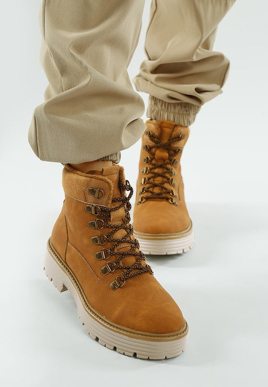 Tan Boskoff Lace-Up Chunky Ankle Boots with high ankle shaft, lace-up detail, and lug sole.