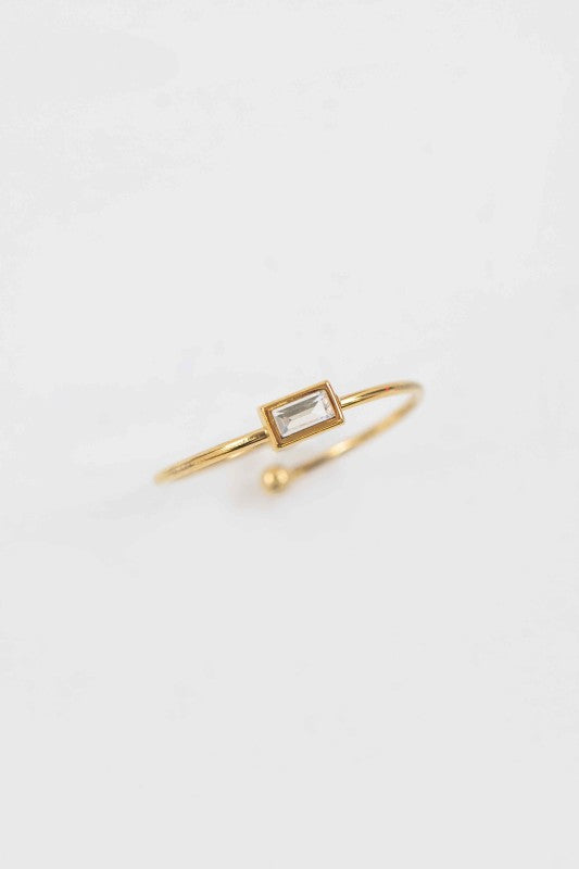 Rectangle Charm Adjustable Ring top view with baguette stone and slim gold band