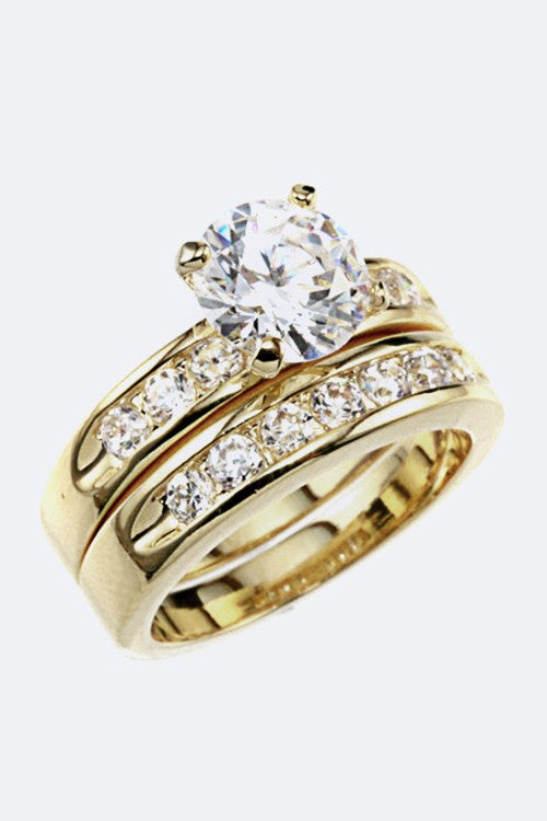 Gold-plated Audrey Double Ring Set featuring two cubic zirconia–adorned bands stacked together.