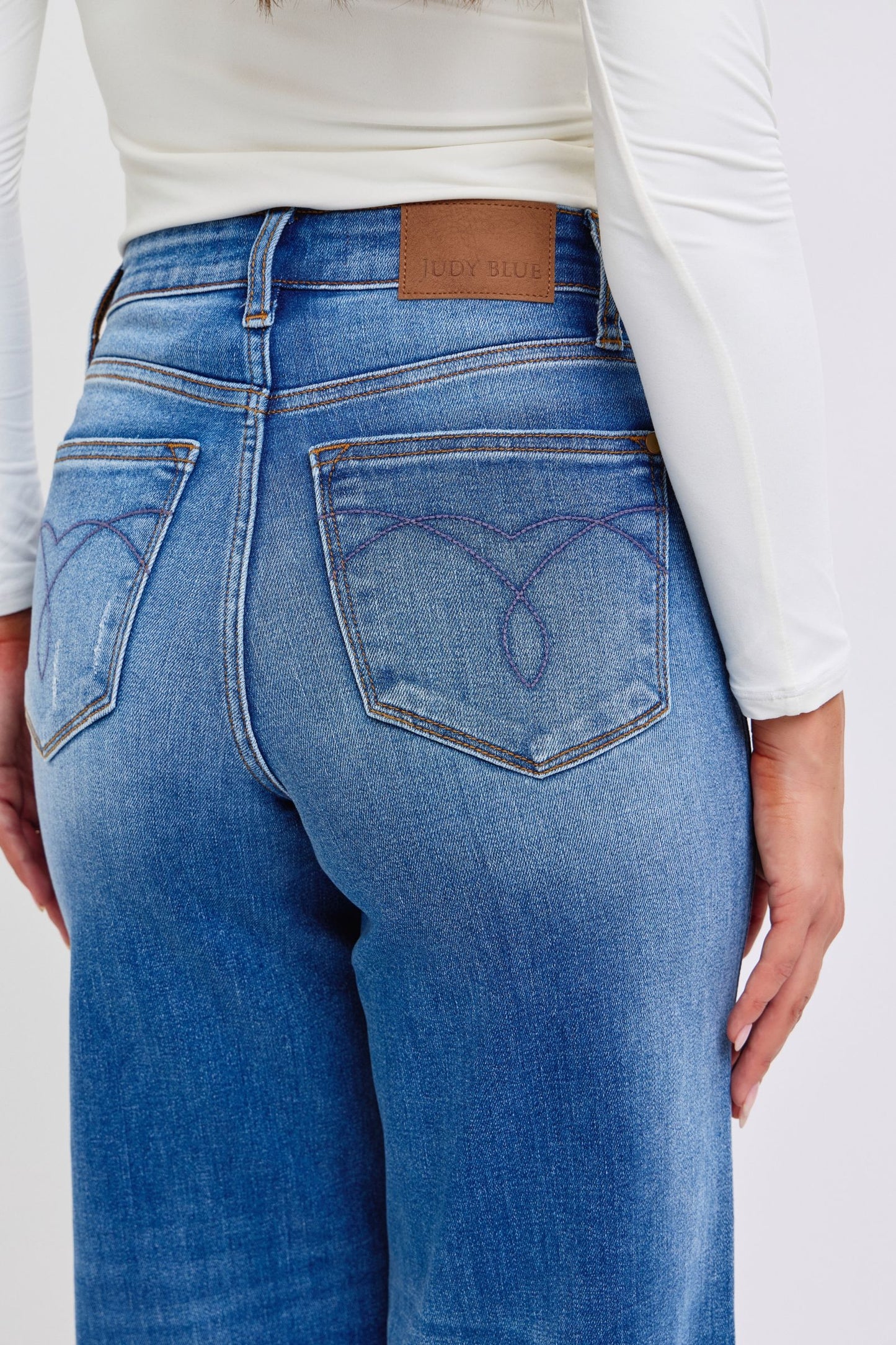 Close back view highlighting pocket design and wide-leg silhouette of Judy Blue Nare Jeans.