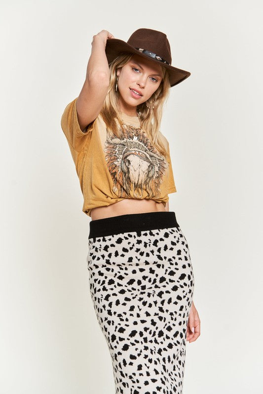 Kilah Animal Print Sweater Skirt in black pattern styled with casual top.